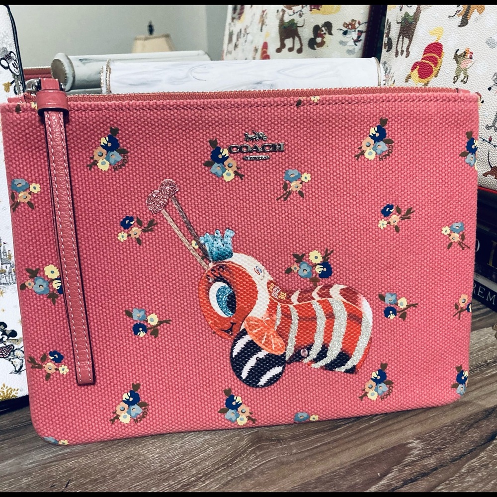 Coach Fisher Price caterpillar lg wristlet